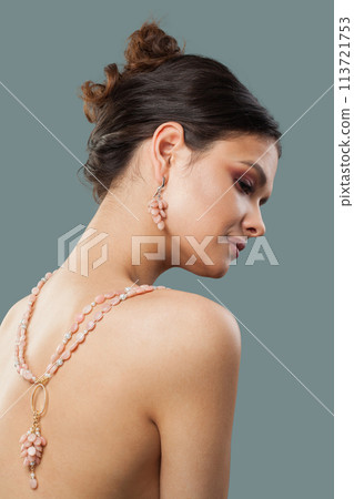 Cheerful stylish brunette fashion model with makeup, wavy hairstyle and healthy clean skin posing Cheerful stylish brunette fashion model with makeup, wavy hairstyle and healthy clean skin posing 113721753