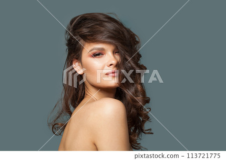 Perfect healthy model woman with beautiful hairstyle, fresh skin and make-up.  113721775