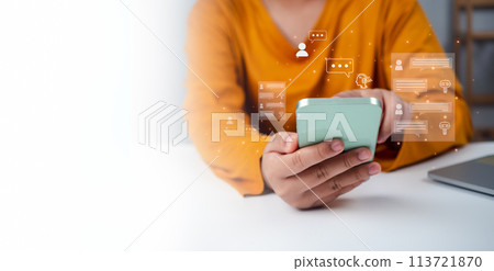 Woman hand use show a smartphone to type live chat, ask, answer with an artificial intelligence system. chatbot. Ai assistant. 113721870