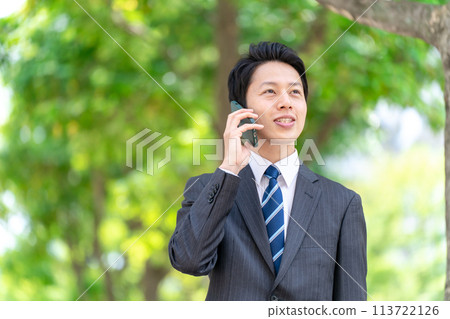 Businessman fresh green smartphone Businessman fresh green smartphone 113722126