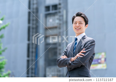 Businessman, middle-aged man, construction site Businessman, middle-aged man, construction site 113722187