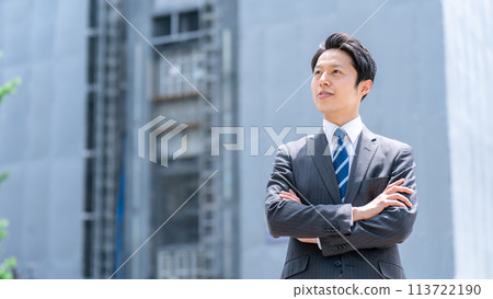 Businessman, middle-aged man, construction site Businessman, middle-aged man, construction site 113722190