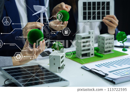 Businessman team brainstorming using tablet, laptop computer for working technology and business,  Renewable energy-based green businesses and global warming. Reduce CO2 emission. 113722595