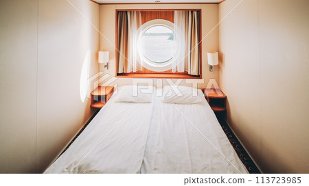 Ship Cabin With Bed And Window With View On Sea. Luxury Cabin On Ferry Boat Or Cruise Liner. 113723985