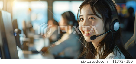 Illustration of call center worker wearing over-ear headphones for company business help desk and telephone assistance concept. Smiling while talking People talking on the phone will feel friendly. Illustration of call center worker wearing over-ear headphones for company business help desk and telephone assistance concept. Smiling while talking People talking on the phone will feel friendly. 113724199