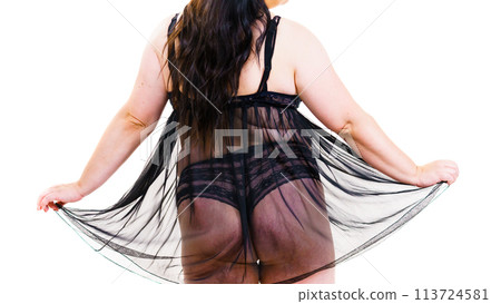 Plus size woman in lingerie tunic 113724581