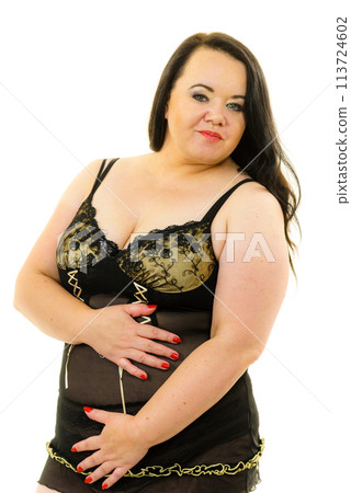 Plus size woman in lingerie tunic 113724602