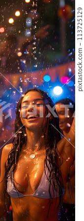 A beautiful woman who is extremely happy, It was as if in her mind she saw herself happily dancing outdoors with her friends in the rain the lights lit up with beautiful colors refreshing atmosphere. A beautiful woman who is extremely happy, It was as if in her mind she saw herself happily dancing outdoors with her friends in the rain the lights lit up with beautiful colors refreshing atmosphere. 113725129
