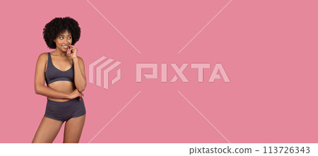 African American woman with a curious expression 113726343