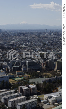 Mount Fuji in the distance and the Tokyo cityscape as seen from Yebisu Garden Place Tower Mount Fuji in the distance and the Tokyo cityscape as seen from Yebisu Garden Place Tower 113726927
