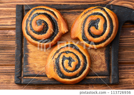 Homemade bun with poppy seeds 113726936