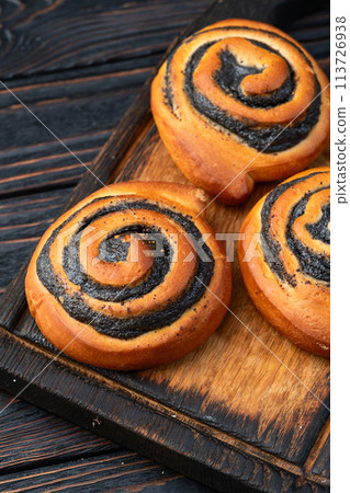 Homemade bun with poppy seeds 113726938