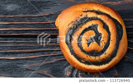 Homemade bun with poppy seeds 113726940