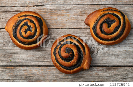 Homemade bun with poppy seeds 113726941
