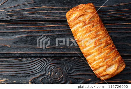 Golden Puff pastry stuffed with sausage and cheese 113726990