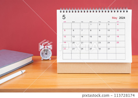 May Monthly desk calendar for 2024 year and alarm clock. May Monthly desk calendar for 2024 year and alarm clock. 113728174