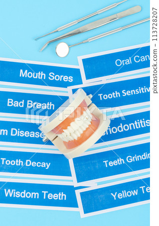 Dentures model with dental disease on blue. Dentures model with dental disease on blue. 113728207