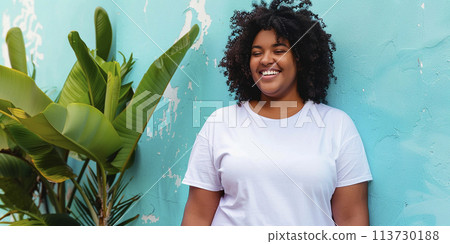 Portrait of a beautiful confident African American plus size model 113730188