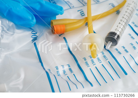 Foley catheter and urine drainage bag collect urine for disability or patient in hospital. Foley catheter and urine drainage bag collect urine for disability or patient in hospital. 113730266
