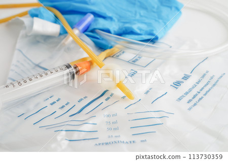 Foley catheter and urine drainage bag collect urine for disability or patient in hospital. 113730359