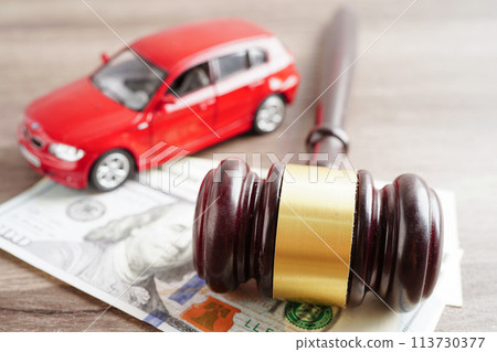 Bangkok, Thailand March 15, 2023 Car accident lawsuit and insurance, Judge hammer with car model. 113730377