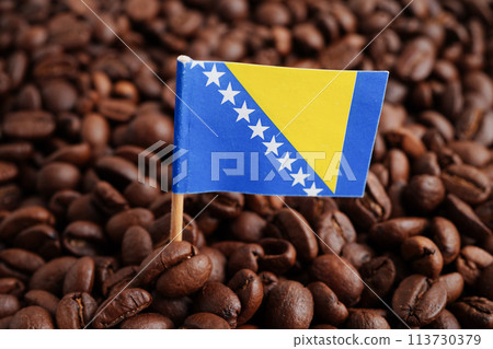 Bosnia and Herzegovina flag on coffee beans, shopping online for export or import food product. Bosnia and Herzegovina flag on coffee beans, shopping online for export or import food product. 113730379
