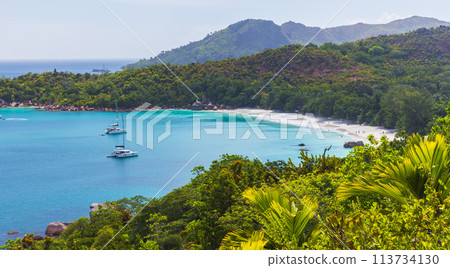 Panoramic photo of Anse Lazio beach on a sunny day. Praslin island, Seychelles Panoramic photo of Anse Lazio beach on a sunny day. Praslin island, Seychelles 113734130