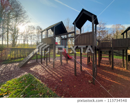 Colorful playground on yard in the park. Colorful playground on yard in the park. 113734548