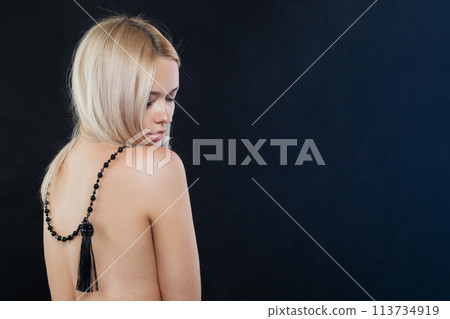 Cute woman with fashion jewellery accessories long necklace. Female back. Blonde model lady Cute woman with fashion jewellery accessories long necklace. Female back. Blonde model lady 113734919