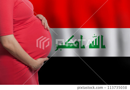 Pregnant woman belly on flag of Iraq background 113735038