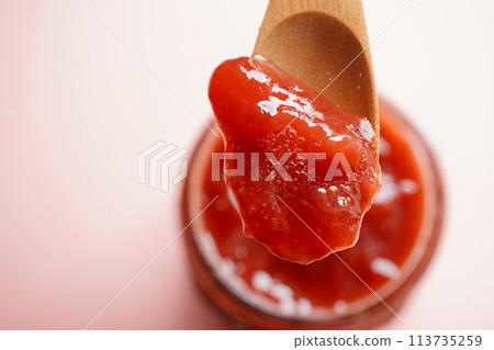 Spoon in some delicious freshly made strawberry jam, made right at the farm. 113735259