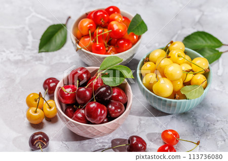 A vibrant and colorful cherry, bursting with sweet juiciness A vibrant and colorful cherry, bursting with sweet juiciness 113736080