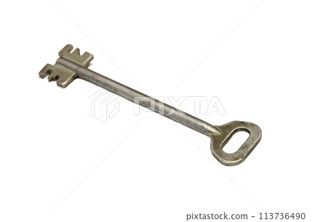 Closeup of a key, a tool made of nickel or steel, on a white background 113736490