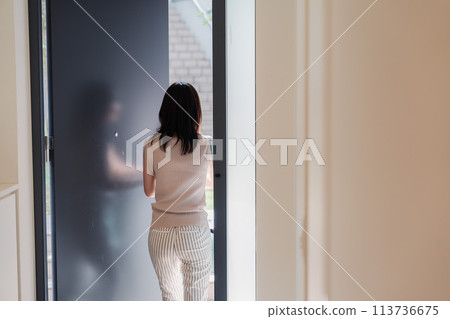 Young woman leaving home Young woman leaving home 113736675