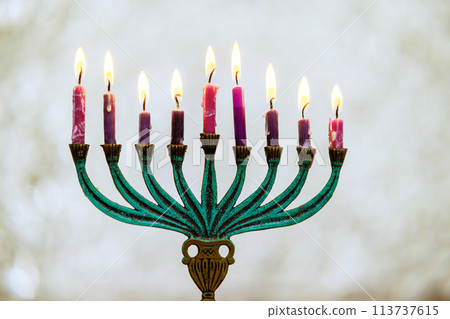 Jewish Religion holiday symbol for Hanukkah it Hanukkiah Menorah with burn candles Jewish Religion holiday symbol for Hanukkah it Hanukkiah Menorah with burn candles 113737615