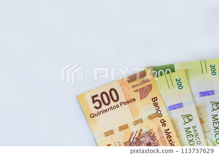 Mexican cash banknotes of different denominations 200, 500, pesos paper bills Mexican cash banknotes of different denominations 200, 500, pesos paper bills 113737629