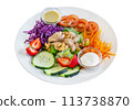 Concept of healthy nutritious food bowl with chicken breast vegetables cabbage carrots nuts cherry tomatoes on white background closeup. 113738870