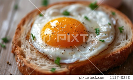 Close-up of a fried egg atop fresh bread, a simple and satisfying meal, Ai Generated 113740228
