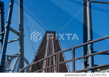 Blue sky and roller coaster rails Blue sky and roller coaster rails 113741743