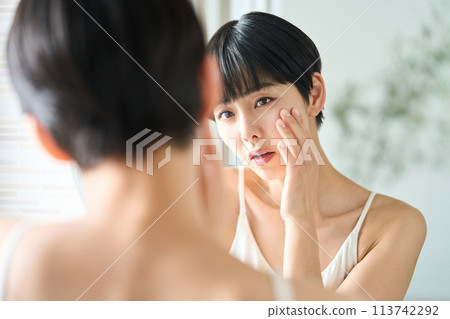 Woman with bad skin Woman with bad skin 113742292