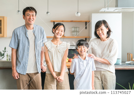 Smiling, friendly family of four (family photo) 113745027