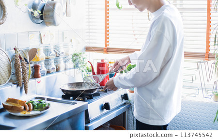 Man cooking Man cooking 113745542