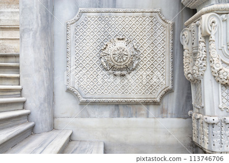 Aged marble wall of Ihlamur Pavilion with carved pattern ornaments and carved details, Istanbul, Turkey Aged marble wall of Ihlamur Pavilion with carved pattern ornaments and carved details, Istanbul, Turkey 113746706