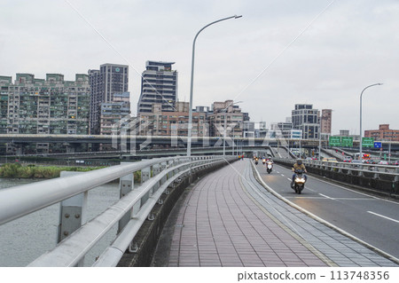 View of New Taipei City from the Taipei Bridge over the Tamsui River View of New Taipei City from the Taipei Bridge over the Tamsui River 113748356