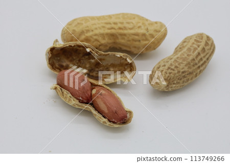 Peanuts lined up on a white background Peanuts lined up on a white background 113749266