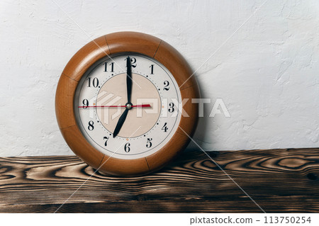 clock with hands showing the time 7-00, seven o'clock, time to get up for work clock with hands showing the time 7-00, seven o'clock, time to get up for work 113750254