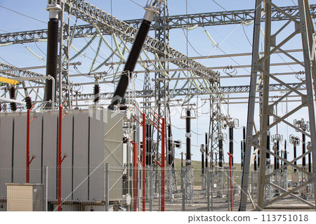 Skyline filled with power lines and transformers at a public utility station 113751018