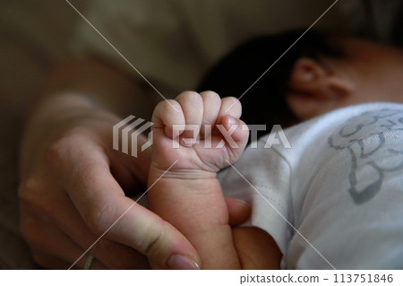 Handle with a newborn baby's cam 113751846