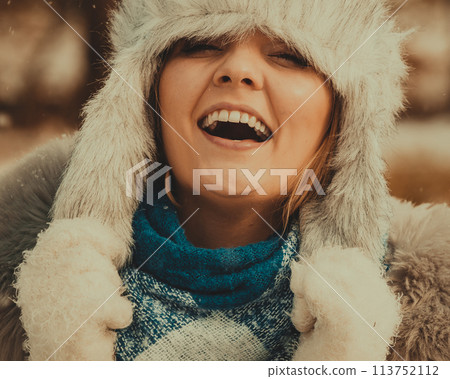 Female wearing warm outfit during winter Female wearing warm outfit during winter 113752112