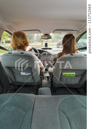 Man and woman in car Man and woman in car 113752669